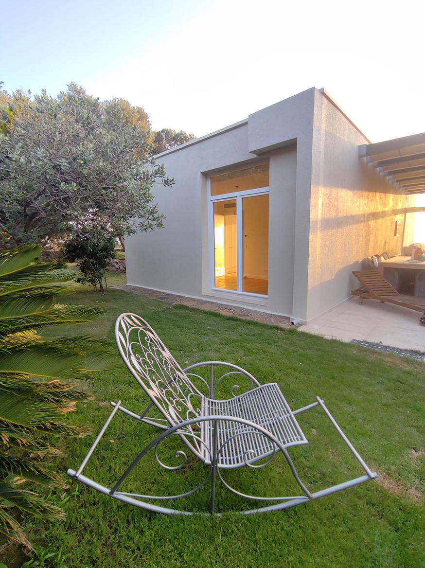 FI Evi — Tamamlanan dış cephe ve bahçe